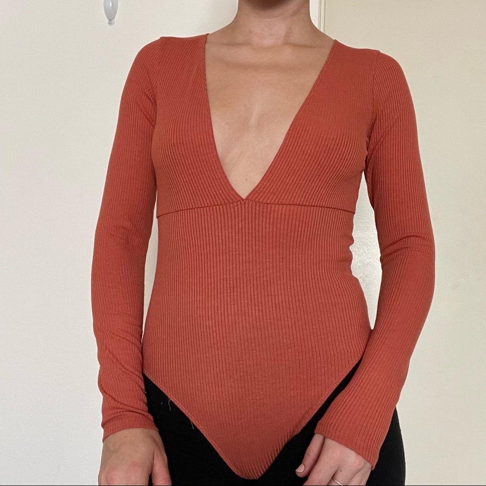 Forever 21 burnt orange long sleeve deep V bodysuit